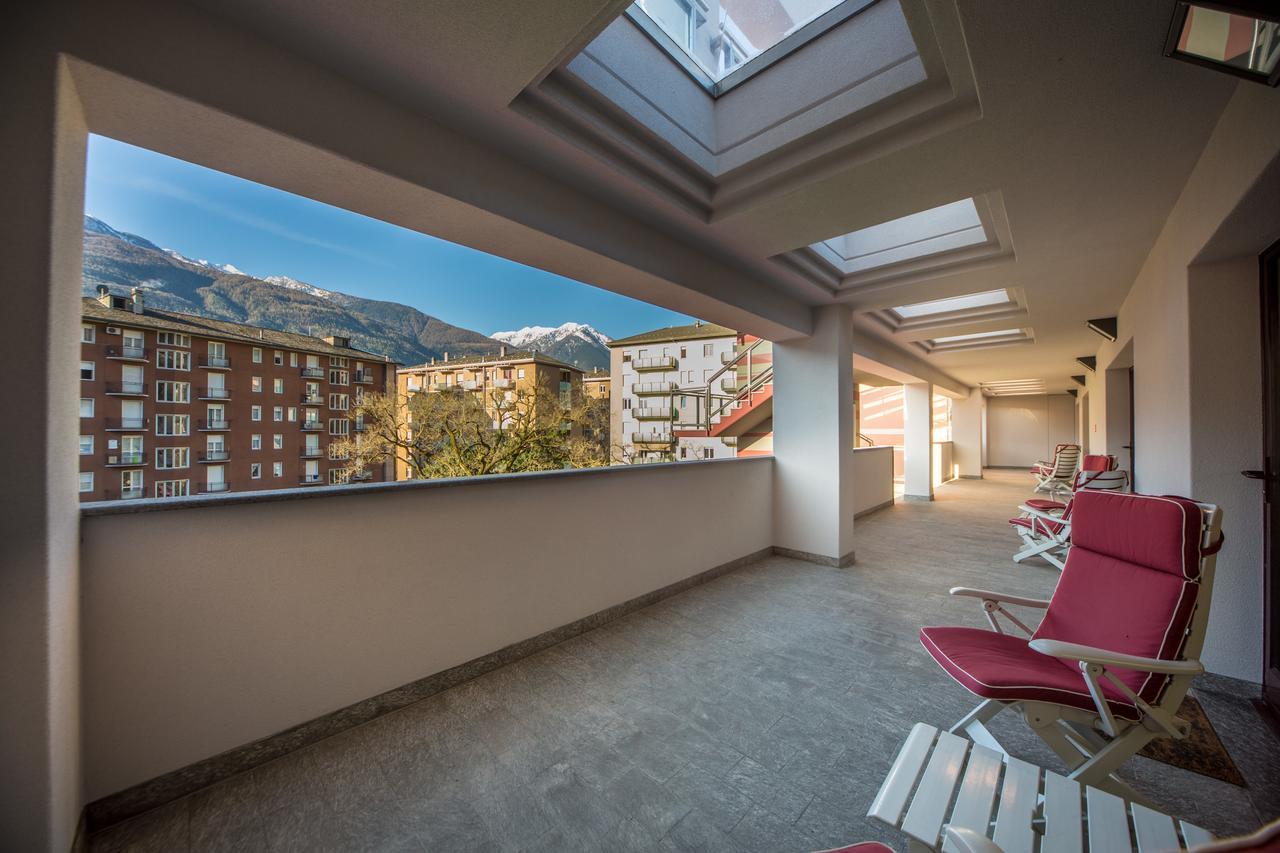 Piazzi House Aparthotel Sondrio Bagian luar foto
