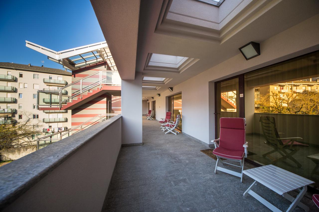 Piazzi House Aparthotel Sondrio Bagian luar foto
