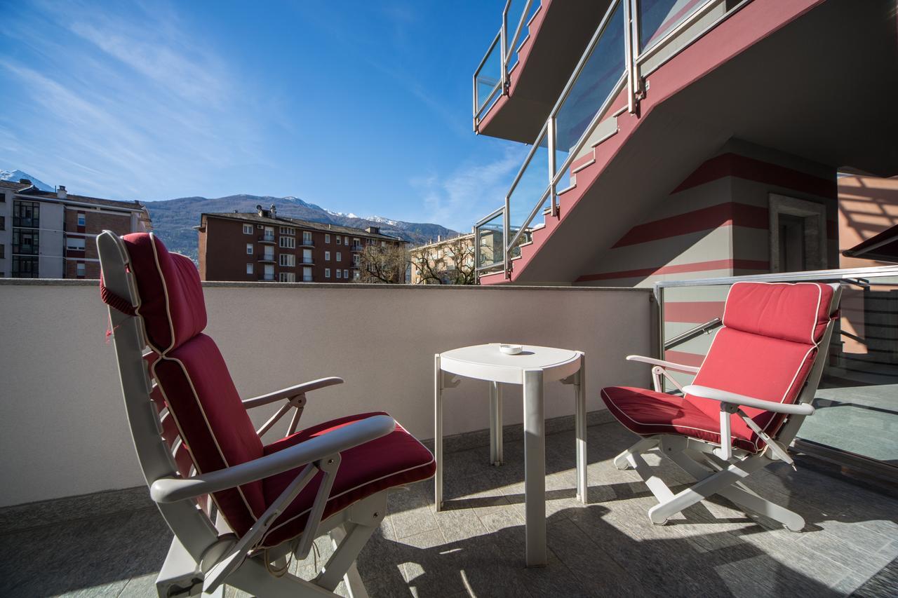 Piazzi House Aparthotel Sondrio Bagian luar foto